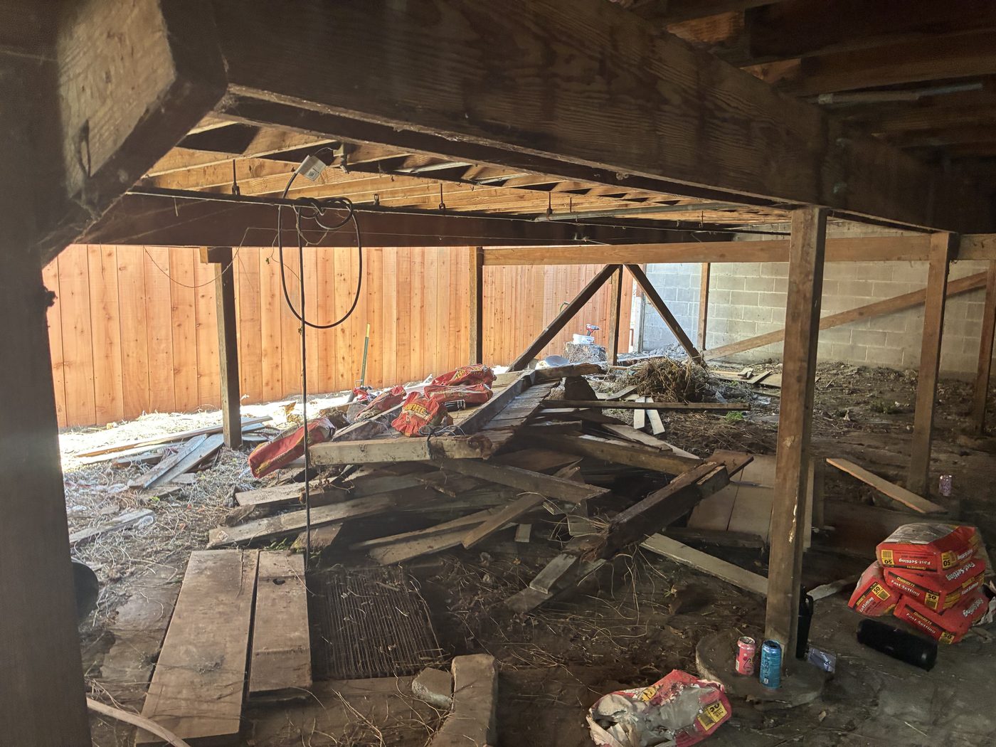 Truck bed loaded and netted with furniture and scrap